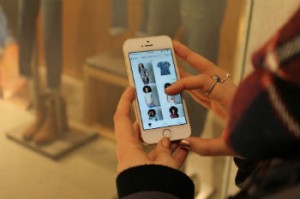 Shoppers can access a retailer’s website or app by connecting via mobile device. [Photo © Mackenzie Kearnan]