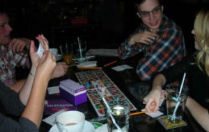  Kayla Schultz, Daniel Kolanko & friends are regulars at Ottawa’s board game cafés/lounges. [©Melissa Novacaska]