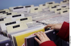 A customer browses the record bins at downtown store Vertigo Records