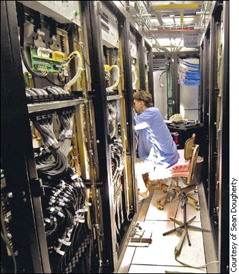 A scientist installs the correlator racks
