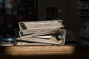 A pile of three-ring binders