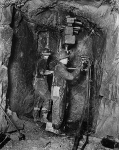 Gold minetrsr working underground in the 1930s