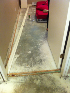 After water damaged the floor, Donahue returned to cold concrete, dust and exposed nails.