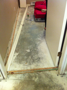 After water damaged the floor, Donahue returned to cold concrete, dust and exposed nails. 